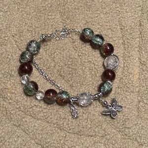 Elegant Green and Brown Beaded Bracelet with Butterfly Charm